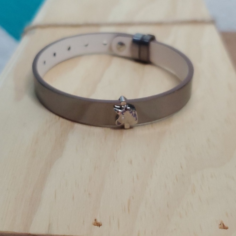 Keep Collective band and unicorn charm
